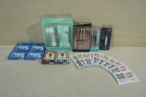 lot 28 image: Womens Beauty Items - Lashes, Lip Balm, Facial Kit, Makeup Brushes