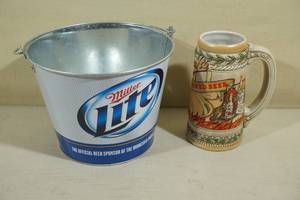 lot 85 image: Miller Lite Ice Bucket and Strohs Beer Stein