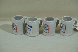 lot 86 image: Miniature Stoneware Anheiser Busch Beer Mugs