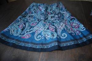 4 skirts size 8...