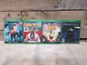 lot 46 image: 4 Pack of XBOX ONE games - Injustice2it takes twoFarcry6Battlefield 2042