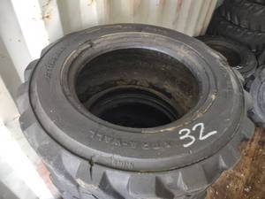 (4) Xtra Wall 12-16.5 Tires...