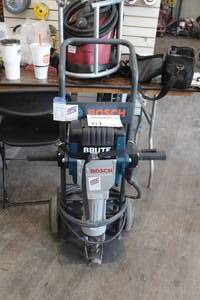 lot 61 image: Bosch 3611C0A011 Brute Jack Hammer with cart