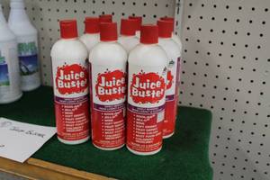 lot 46P image: Lot of (9) Juice Buster 16-oz Plastic Bottles