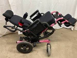 lot 3 image: WOW MSRP $4000 Quickie Iris Tilt-in-Space Wheelchair With Many Extras - Heavy Duty Pink Sparkle Frame - Seat Width 18 Excellent Condition 2 Used Ones Just Sold Online For $2000 Each