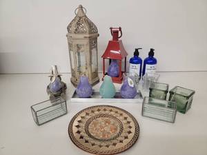 lot 20 image: Artisan Candles,Blue Glass Soap Dispensers, Decorative Bird Cage Lanterns And More