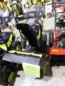 lot 61 image: RYOBI 40V HP Brushless Cordless Electric 24 in. Self-Propelled 2-Stage Snow Blower - (4) 6.0 Ah Batteries & Dual-Port Charger