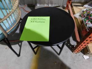 lot 67 image: Round Black Night stand