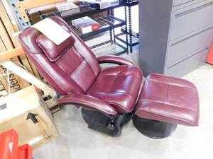 lot 95 image: Progressive Furniture Merlot Top Grain Leather Swivel Recliner with Ottoman