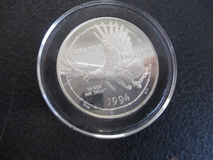30. 1994-P National Prisioner of War Museum US Silver Dollar 1oz Silver Commemorative in Protective, Removable Capsule