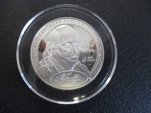 31. 1706-2006-P Benjarmin Franklin 1776 Continental Currency 1oz US Silver Commemorative Dollar.