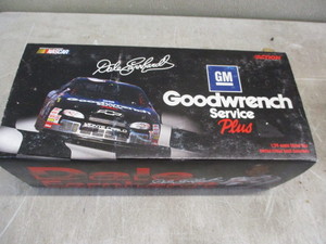 4. Action 124th Scale NASCAR Die Cast Car Collectable #3 Dale Earnhardt GM Goodwrench Plus 1999 Chevy Monte Carlo.