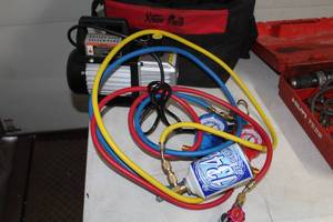 lot 753 image: 71096 AC Rotary Vane Single Stage Vacuum Pump Kit, Case