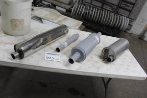 lot 923 image: Lot of (3) Assorted Mufflers, (1) Pipe