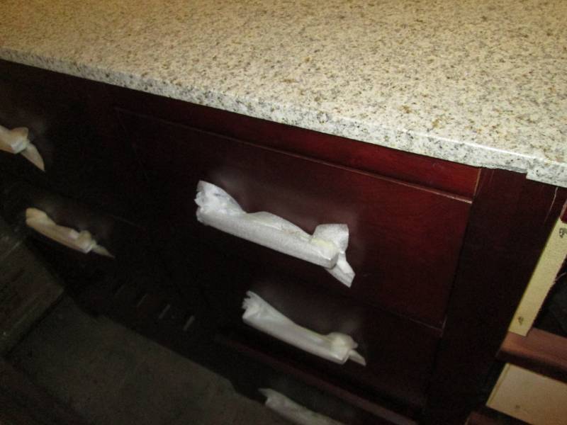 Double sink vanity as pictured.  Ctack in top and 2 drawer fronts need to be reattached