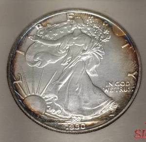 1990 AMERICAN SILVER EAGLE 1 TROY OZ .999 FINE SILVER NICE EDGE TONING