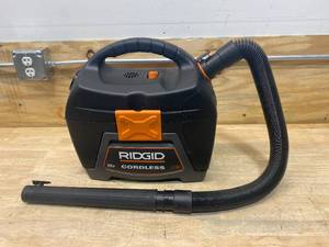 lot 74 image: RIDGID  3 Gal. 18-Volt Cordless Handheld WetDry Shop Vacuum- Battery Included