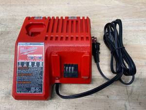 lot 40 image: MILWAUKEE M12 and M18 12-Volt18-Volt Lithium-Ion Multi-Voltage Battery Charger