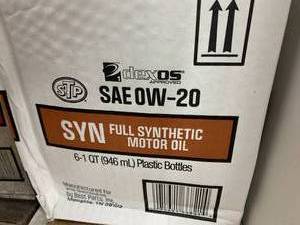 lot 18 image: STP OIL SYN SAE -0W-20