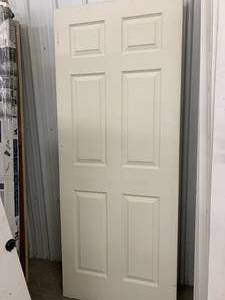 lot 69 image: JELDWEN COLONIST 6 PANEL TEXTURED DOOR