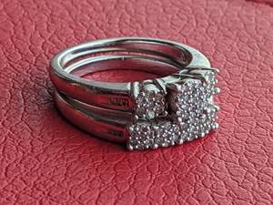 lot 6 image: Exquisite Sterling and Diamond Wedding Ring Set