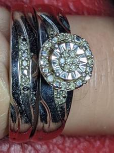 lot 13 image: Sterling Silver and Diamond Wedding Ring Set