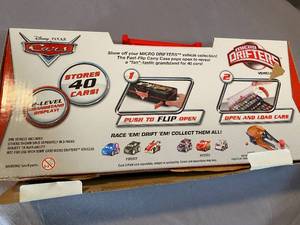 lot 257 image: Disney Pixar Cars MICRO DRIFTERS Radiator Springs Fast Flip CARRY CASE