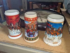 lot 27 image: 6 Collectible Budweiser Holiday Steins