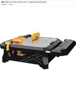 QEP 700XT 34 HP Wet Tile Saw with 7 in. Blade and Table Extension. See Pictures
