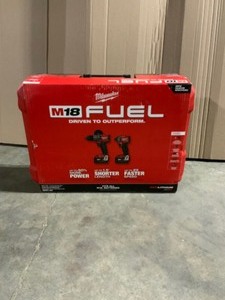Milwaukee M18 FUEL 18-Volt Lithium-Ion Brushless Cordless Hammer Drill and Impact Driver Combo Kit (2-Tool) with Two 5Ah Batteries. See Pictures
