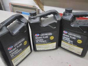 lot 93 image: 31gallon jugs of carquest wearever...