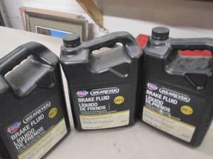 lot 97 image: 31gallon jugs of carquest wearever...