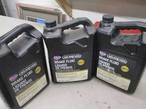 lot 98 image: 31gallon jugs of carquest wearever...