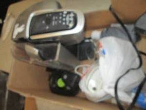 lot 120 image: keurig  and dental flosser untested...