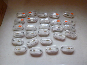 Case of Peterson Mfg. Clear Marker Lights