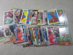 lot 34 image: (EC1) 50 Assorted Ozzie Smith Baseb...