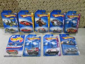 lot 194 image: (C-4) Assorted Hot Wheels in Packag...