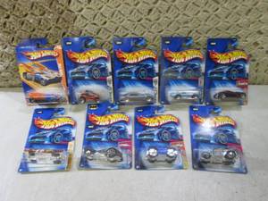 lot 195 image: (C-4) Assorted Hot Wheels in Packag...