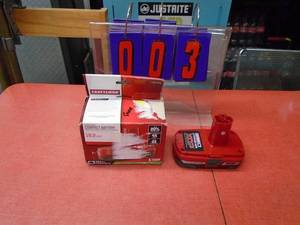 lot 3 image: Craftsman 19.2 lithium ion battery. Like new in box. As shown.