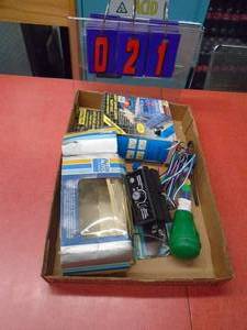 lot 21 image: Flat of automotive items. Antifreeze tester, wiper delay & third brake light. As shown.