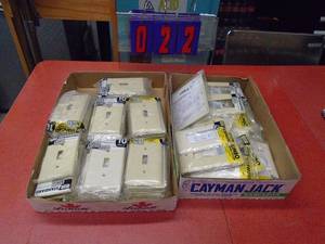 lot 22 image: 2 Large flats of new electrical switches & outlet covers. As shown.