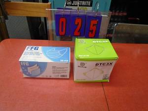 lot 25 image: Box of 20 N95 face masks & box of 50 light duty masks. As shown.