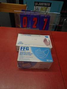 lot 27 image: Box of 50 FFG face masks & box of medium pvc gloves. As shown.