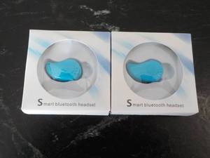 Set of 2 Smart Bluetooth Head Sets...