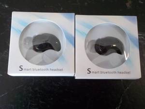 Set of 2 Smart Bluetooth Head Sets...