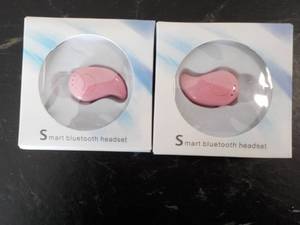 Set of 2 Smart Bluetooth Head Sets...