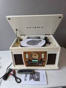 lot 133 image: Victrola Navigator 8-in-1 Classic Bluetooth Record Player with USB Encoding & 3-speed Turntable - N