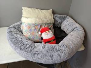 lot 122 image: Dog Bedding, Round Pet Bed, and Santa Dog Toy - N