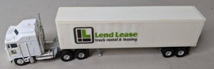 lot 215 image: White Lend Lease Truck Rental and Leasing Tractor Trailer Model - D