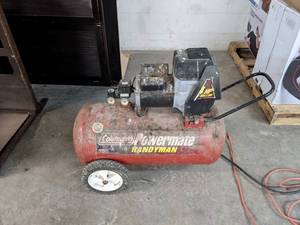 lot 25 image: Coleman Powermate Handyman Portable Electric Air Compressor - N